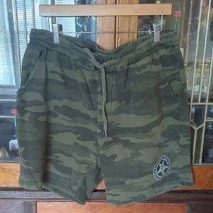 Green Athletic Shorts with Camouflage Design